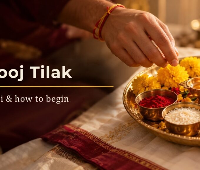 Bhai Dooj 2026 tilak thali with kumkum, akshat, a diya, marigolds, sweets, betel leaf & dry fruits
