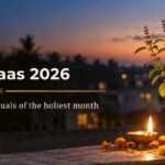 Diya lit beside a tulsi plant at dusk during Kartik maas 2026